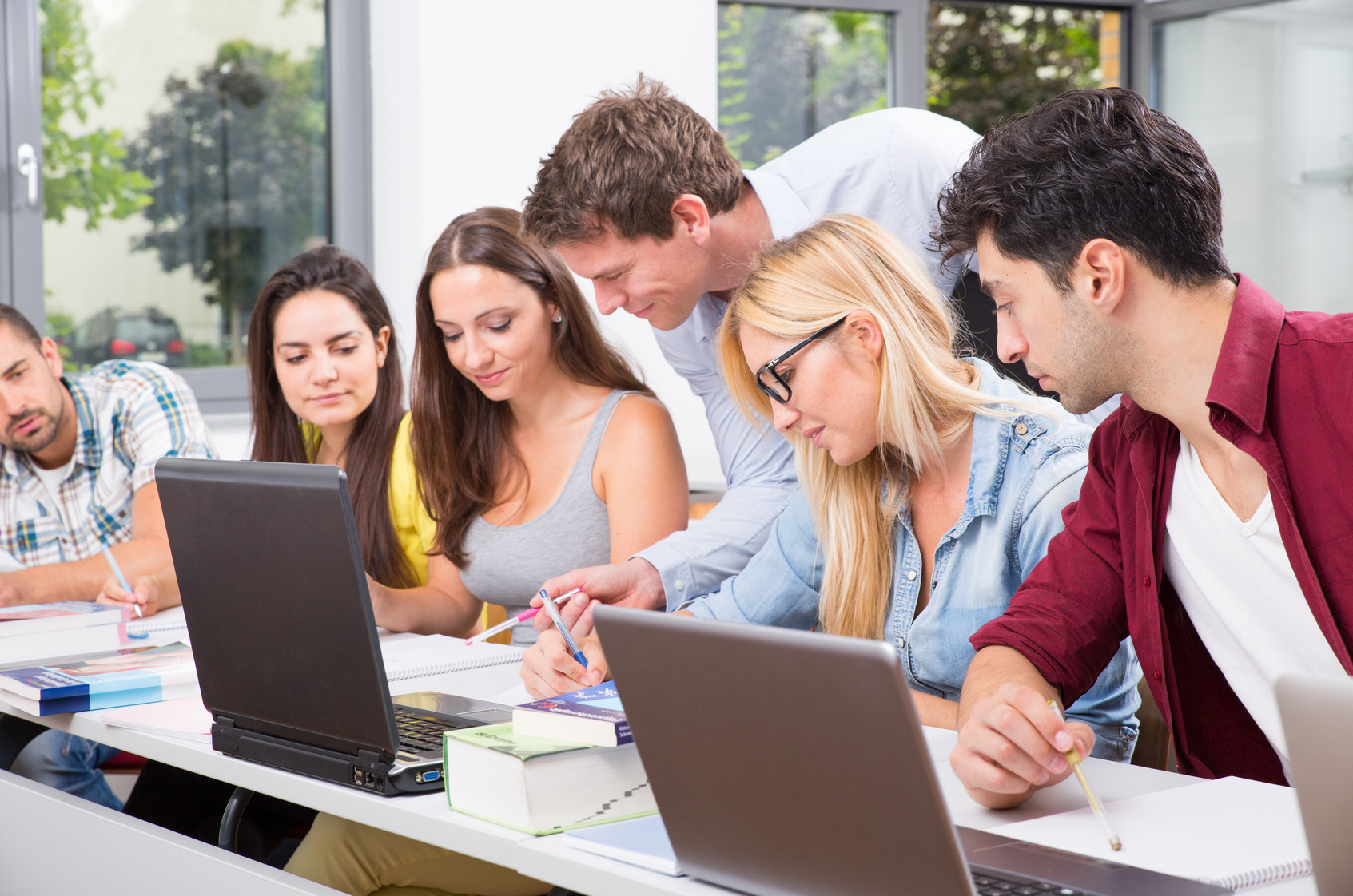 Students studying together in a classroom